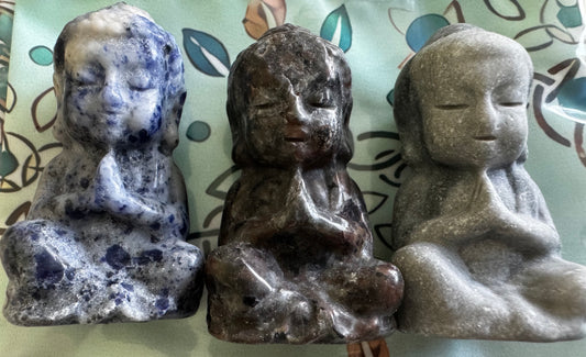 Praying Buddha Carvings